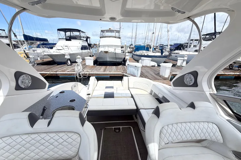 Slide: The Image of Interior view of 2014 Chaparral 327 SSX boat docked at marina. - 22