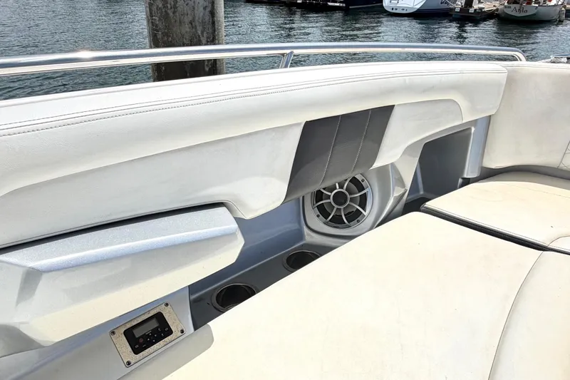 Slide: The Image of Interior of 2014 Chaparral 327 SSX boat with seating and speaker detail. - 37