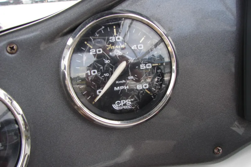 Slide: The Image of Close-up of a 2017 Hurricane SunDeck Sport 202 IO speedometer showing speed in mph and km/h. - 15
