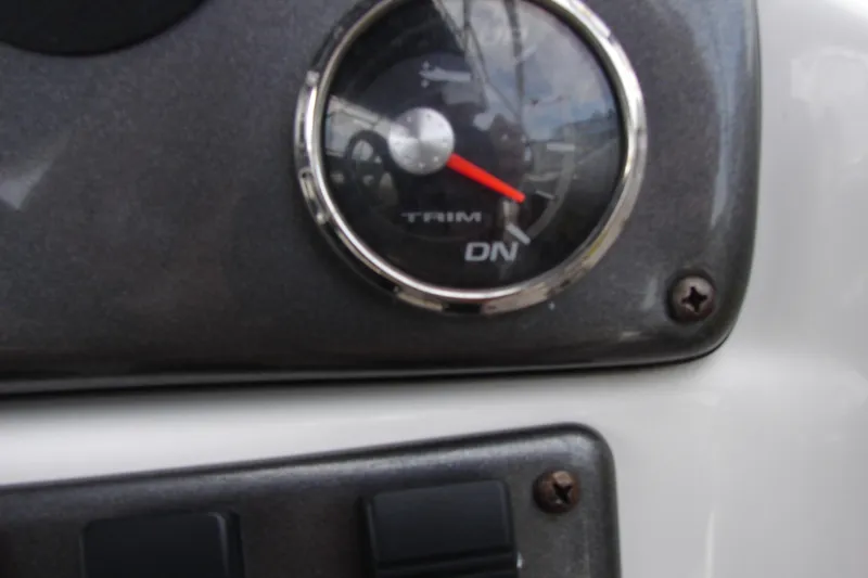 Slide: The Image of Close-up of a 2017 Hurricane SunDeck Sport 202 IO trim gauge. - 16