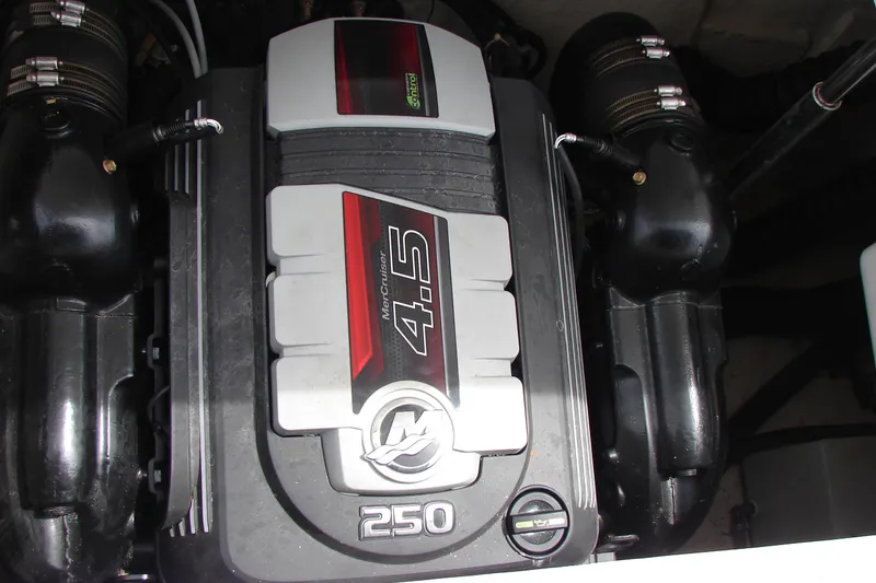 Slide: The Image of 2017 Hurricane SunDeck Sport 202 IO engine, featuring a MerCruiser 4.5L 250 horsepower motor. - 23