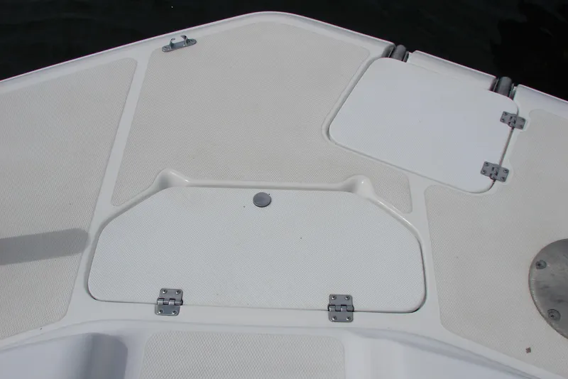 Slide: The Image of 2017 Hurricane SunDeck Sport 202 IO boat deck with storage compartments. - 34
