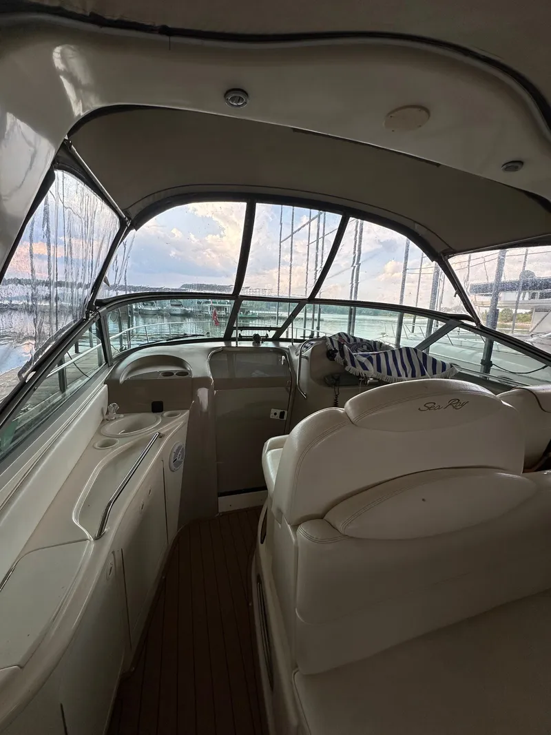 Slide: The Image of Interior of a 1999 Sea Ray 340 Sundancer yacht at sunset. - 14