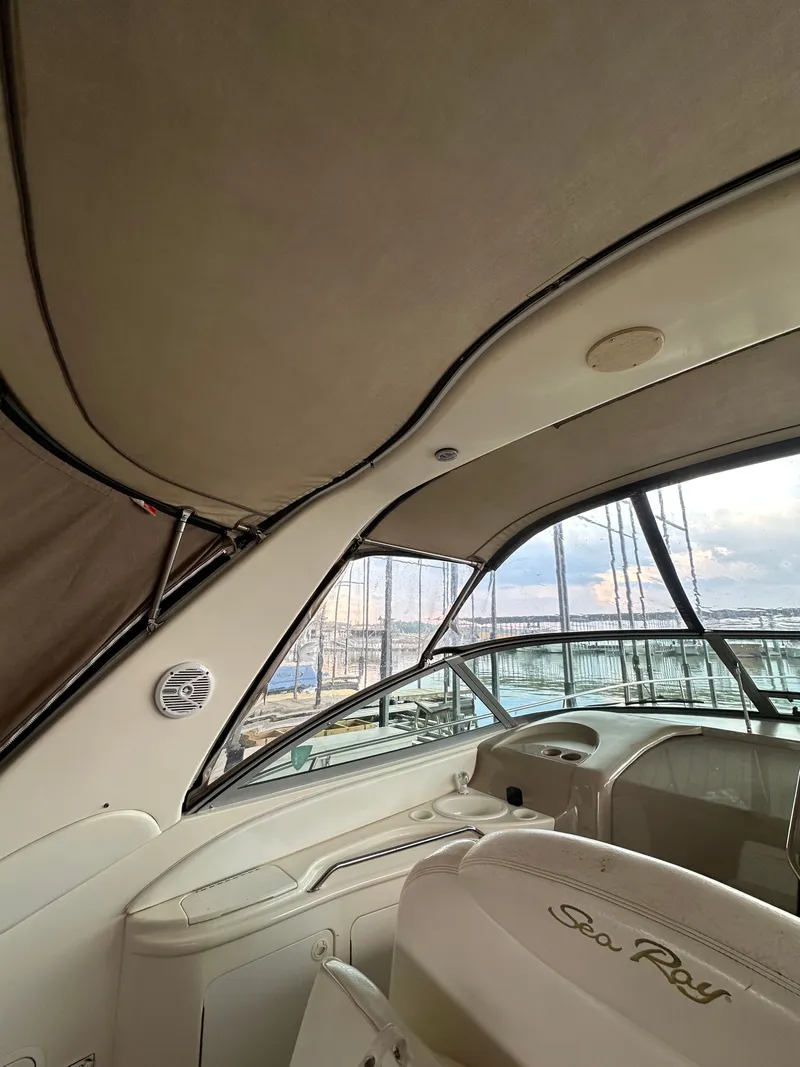Slide: The Image of Interior view of a 1999 Sea Ray 340 Sundancer yacht in harbor. - 19