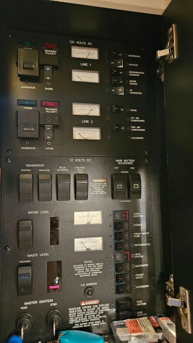 Slide: The Image of Electrical control panel of 1999 Sea Ray 340 Sundancer. - 33
