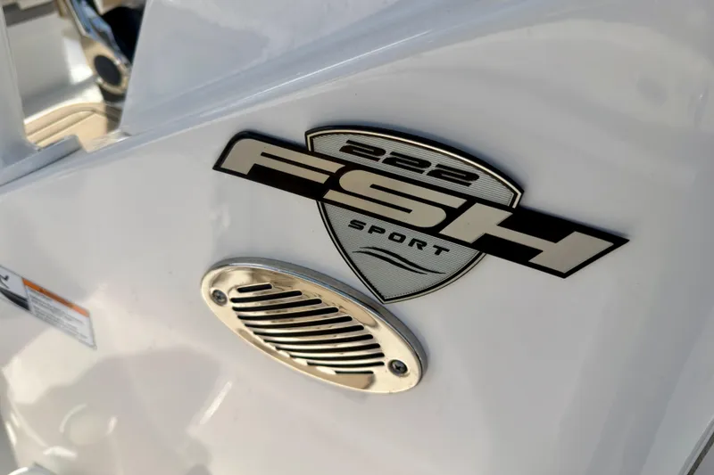 Slide: The Image of 2025 Yamaha Boats 222 FSH Sport logo on sleek white surface. - 29