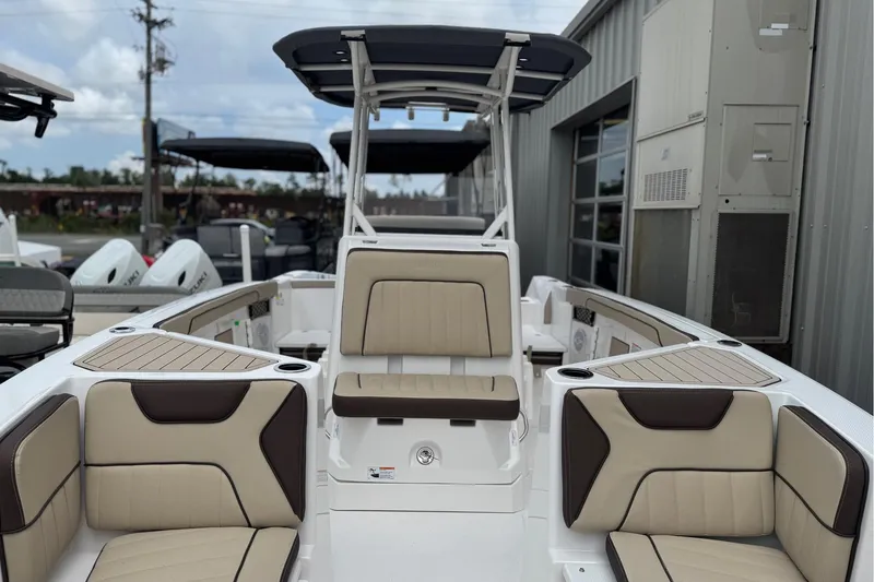 Slide: The Image of 2025 Yamaha Boats 222 FSH Sport interior with beige seating and modern design. - 3