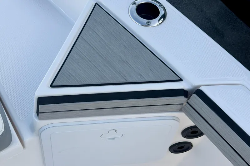 Slide: The Image of 2025 Yamaha Boats 195 FSH Sport deck detail with sleek design and modern features. - 19