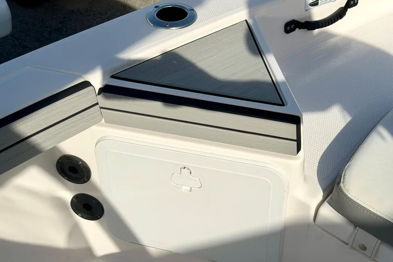 Slide: The Image of Interior detail of 2025 Yamaha Boats 195 FSH Sport, featuring sleek design elements. - 20