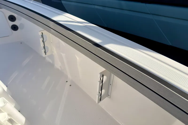 Slide: The Image of 2025 Yamaha Boats 195 FSH Sport interior detail, showcasing sleek design and modern features. - 21