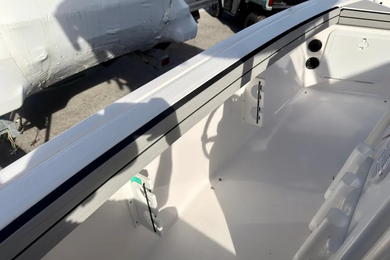 Slide: The Image of 2025 Yamaha Boats 195 FSH Sport interior detail, showcasing sleek design and spacious layout. - 22