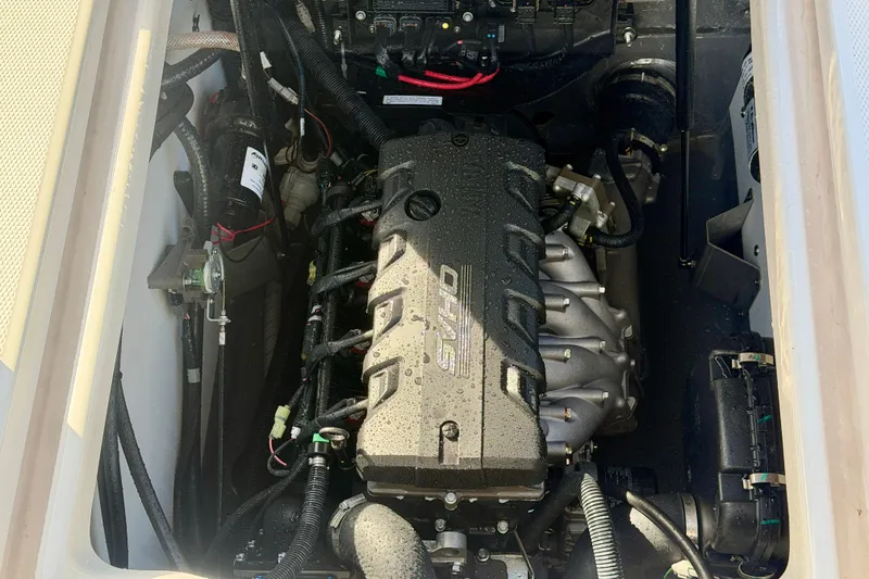 Slide: The Image of Engine compartment of 2025 Yamaha Boats 195 FSH Sport, showcasing advanced marine technology. - 23