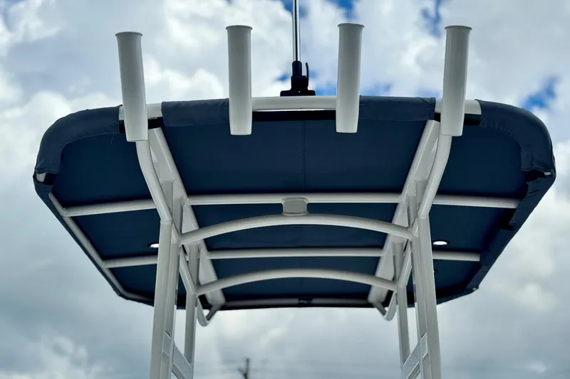 Slide: The Image of Yamaha 195 FSH Sport 2025 boat canopy with fishing rod holders. - 3