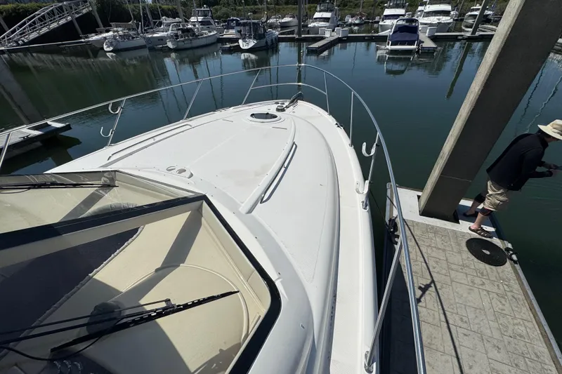 Slide: The Image of 2007 Meridian 411 Sedan yacht docked at marina, viewed from the deck. - 40