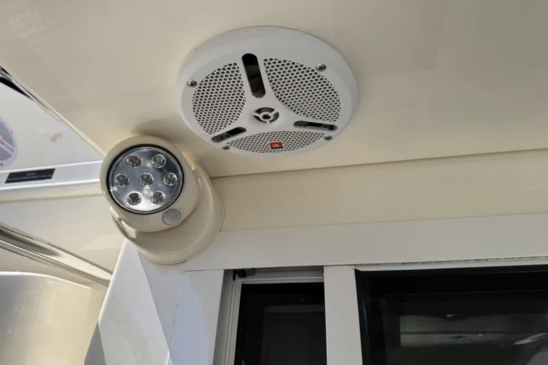 Slide: The Image of Ceiling speaker and light fixture on 2007 Meridian 411 Sedan yacht. - 48
