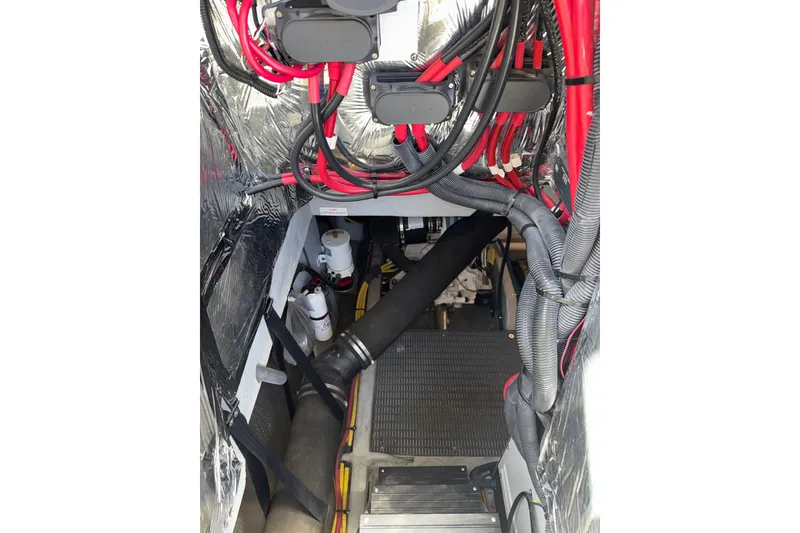 Slide: The Image of Engine room of 2007 Meridian 411 Sedan with wiring and components visible. - 49