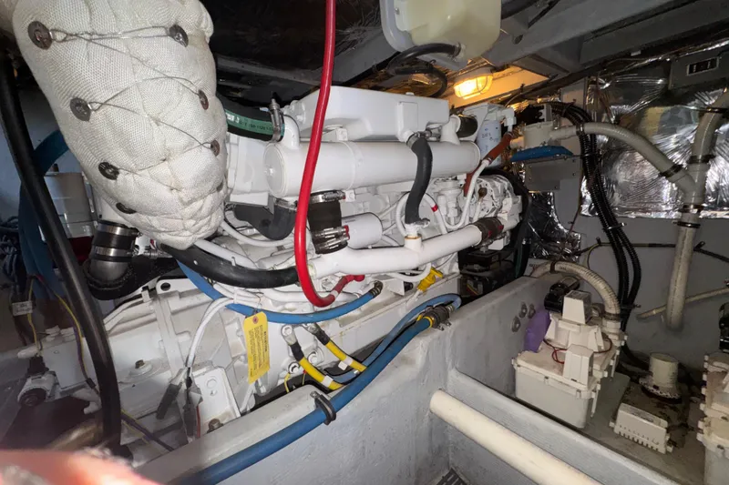 Slide: The Image of Engine room of a 2007 Meridian 411 Sedan with visible wiring and components. - 51