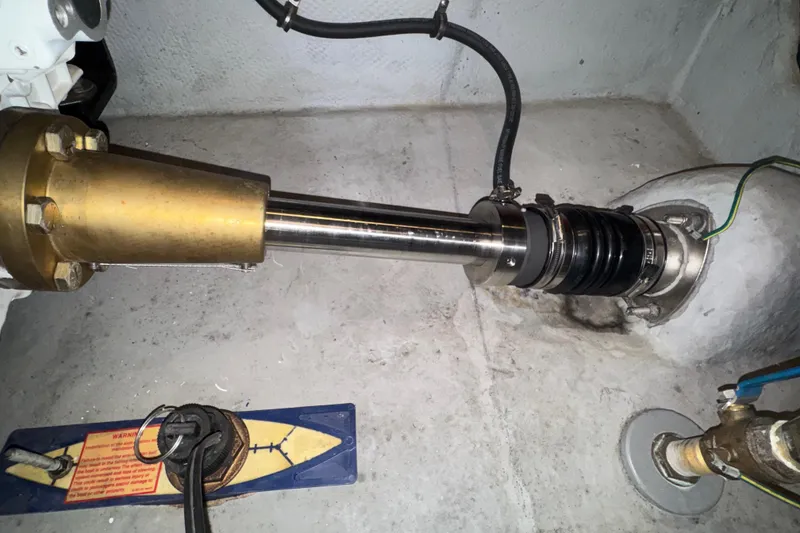 Slide: The Image of Engine room of 2007 Meridian 411 Sedan, showing shaft and mechanical components. - 53