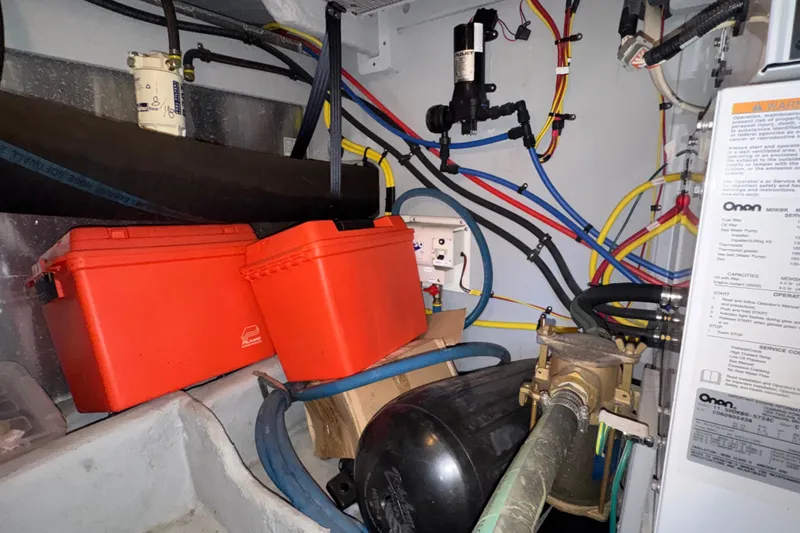 Slide: The Image of Engine room of a 2007 Meridian 411 Sedan with wiring and equipment. - 56