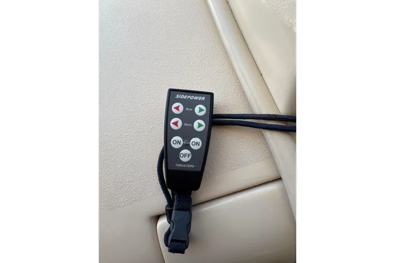 Slide: The Image of Remote control for Side-Power thrusters on a 2007 Meridian 411 Sedan yacht. - 68