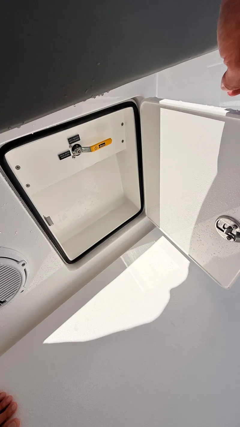Slide: The Image of Valhalla Boatworks V33 2026, open storage compartment on board. - 19