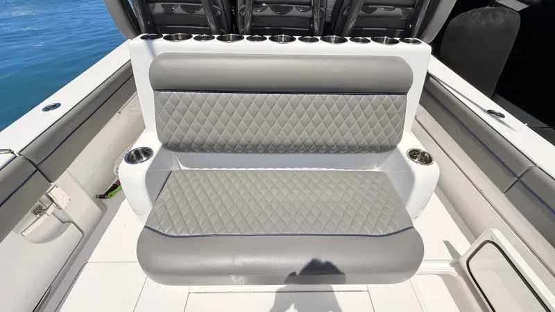 Slide: The Image of Valhalla Boatworks V33 2026, gray diamond-patterned bench seat. - 25