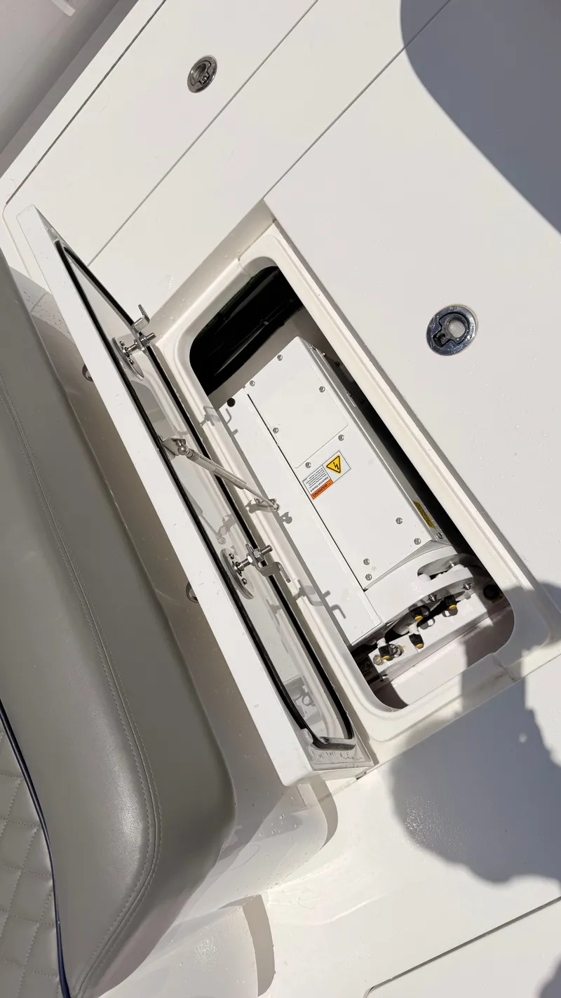 Slide: The Image of Valhalla Boatworks V33 2026, open compartment with equipment. - 28