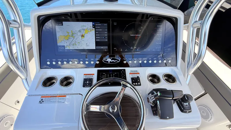 Slide: The Image of 2026 Valhalla Boatworks V33 helm with advanced navigation system. - 3