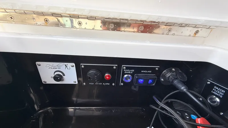 Slide: The Image of 2026 Valhalla Boatworks V33 control panel with pump and windlass controls. - 5