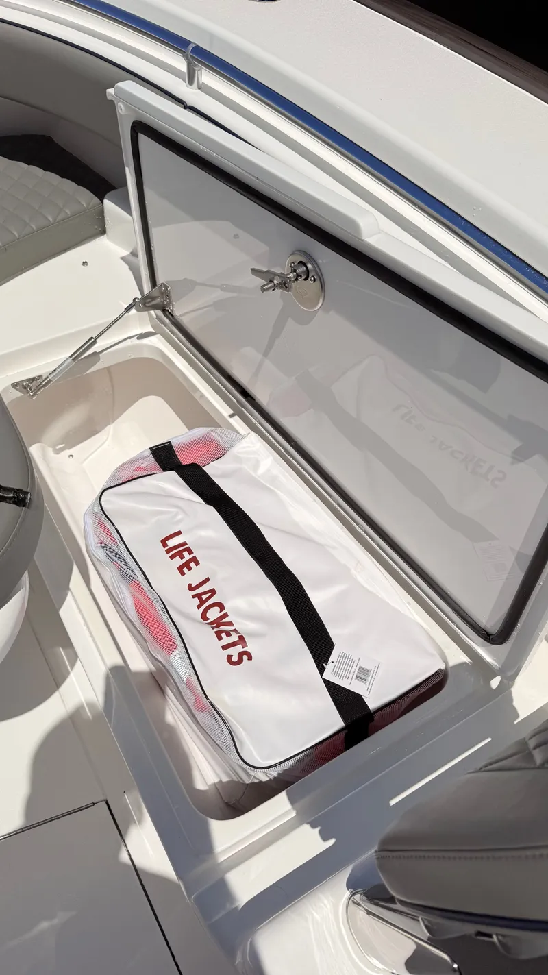 Slide: The Image of Valhalla Boatworks V33 2026 with life jacket storage compartment. - 6