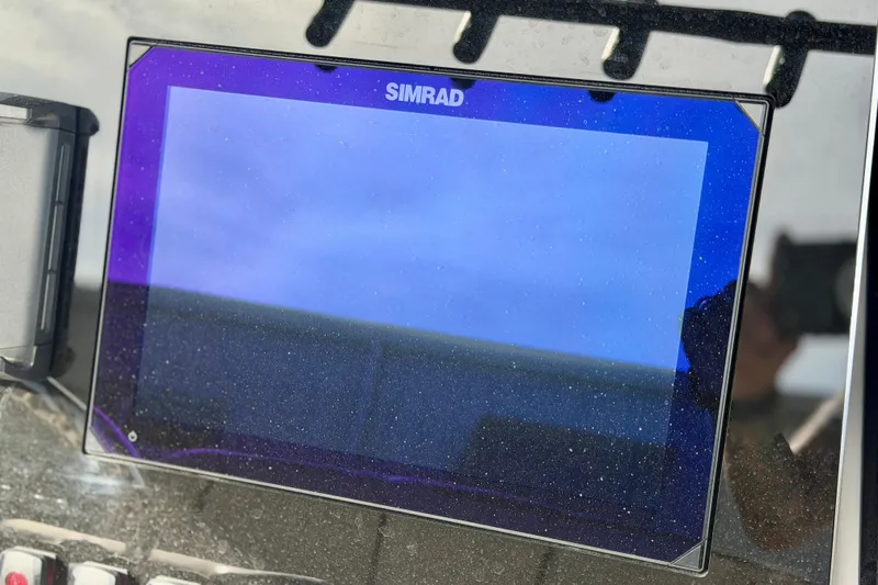Slide: The Image of Simrad display on 2026 Yamaha Boats 255 FSH Sport H dashboard. - 16