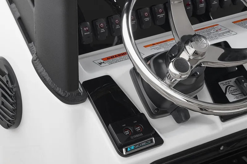 Slide: The Image of Manufacturer Provided Image: Steering console of 2026 Yamaha Boats 255 FSH Sport H, featuring modern controls and sleek design. - 46
