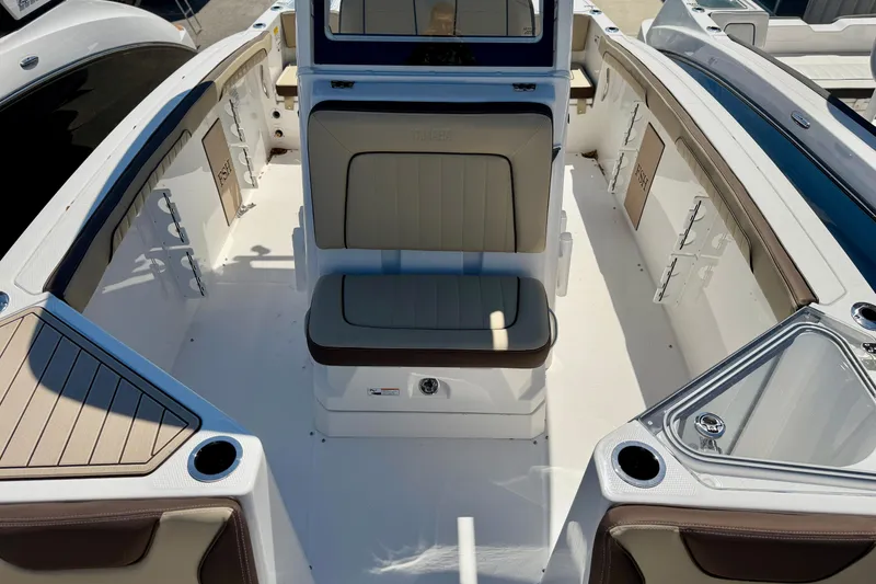 Slide: The Image of 2026 Yamaha Boats 255 FSH Sport H, featuring sleek seating and modern design. - 5