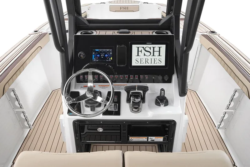 Slide: The Image of Manufacturer Provided Image: 2026 Yamaha Boats 255 FSH Sport H dashboard with steering wheel and control panel. - 33