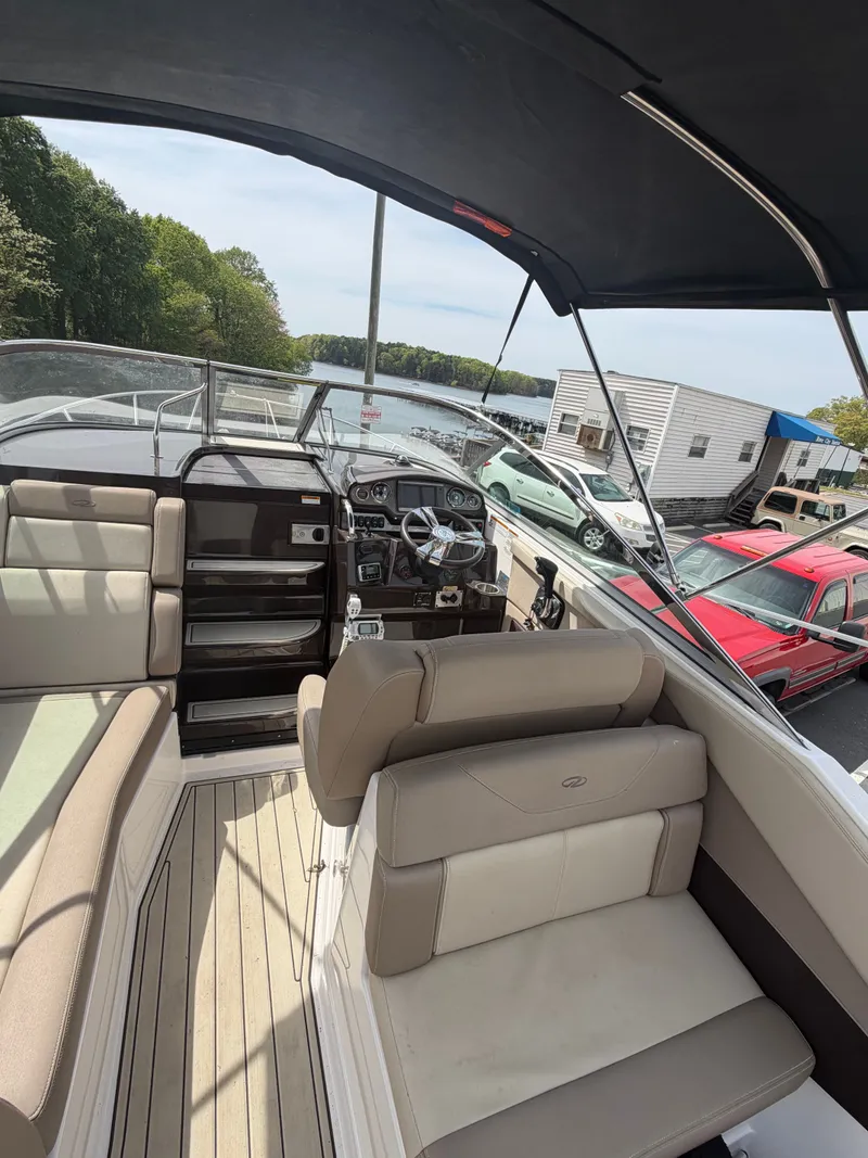 Slide: The Image of Interior of a 2013 Regal 28 Express boat at the dock. - 10