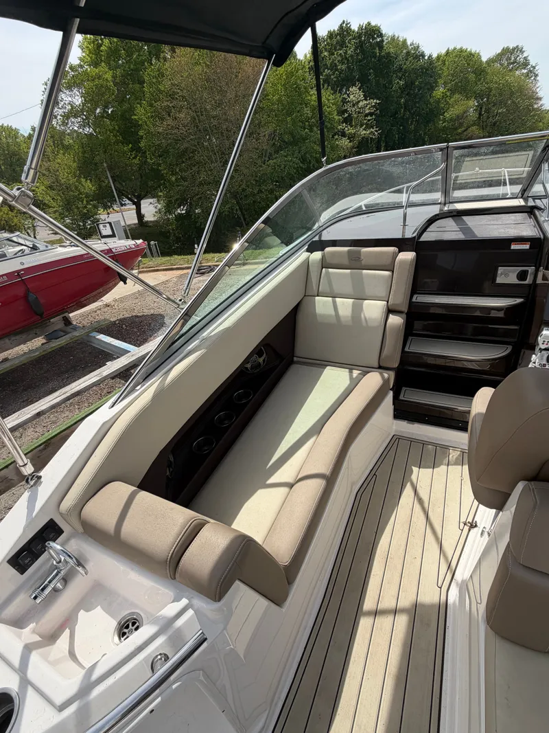 Slide: The Image of Interior of a 2013 Regal 28 Express yacht with seating area. - 11