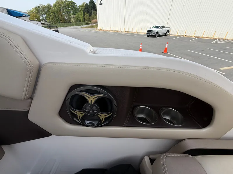 Slide: The Image of Speaker and cup holders in 2013 Regal 28 Express boat. - 14