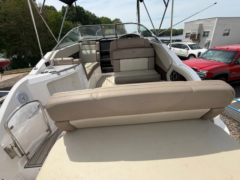 Slide: The Image of Interior of a 2013 Regal 28 Express boat with seating area. - 7