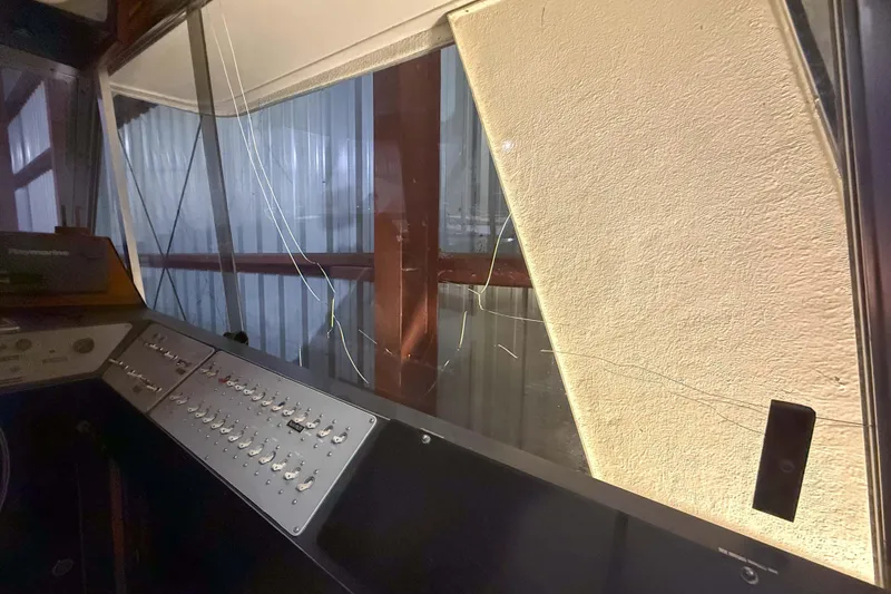 Slide: The Image of Cracked window on 1977 Pacemaker FB Motor Yacht with control panel visible. - 15