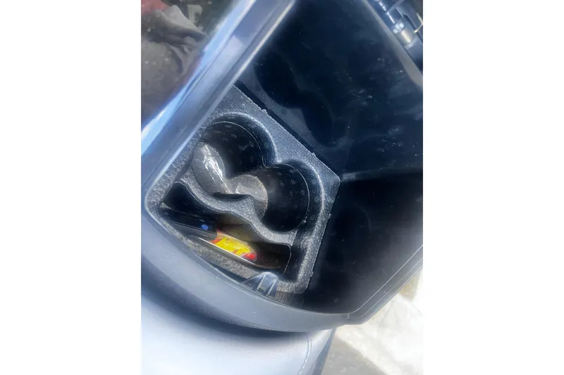 Slide: The Image of Cup holder and storage compartment in a 2016 Yamaha WaveRunner FX Cruiser SVHO. - 14