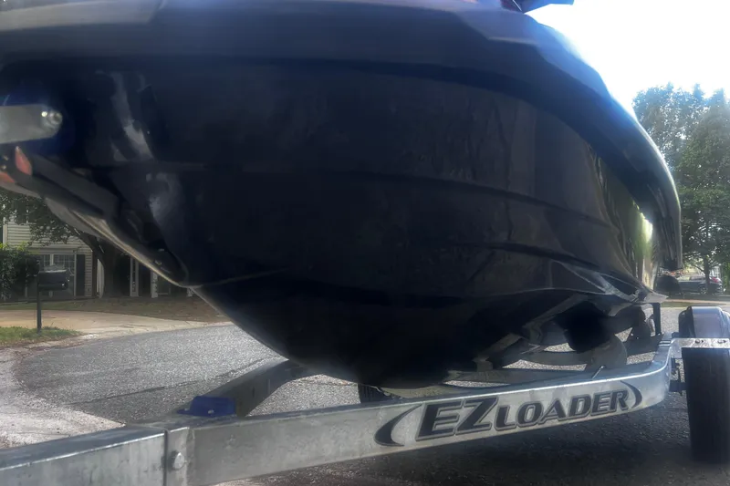 Slide: The Image of 2016 Yamaha WaveRunner FX Cruiser SVHO on EZ Loader trailer, parked on a residential street. - 22