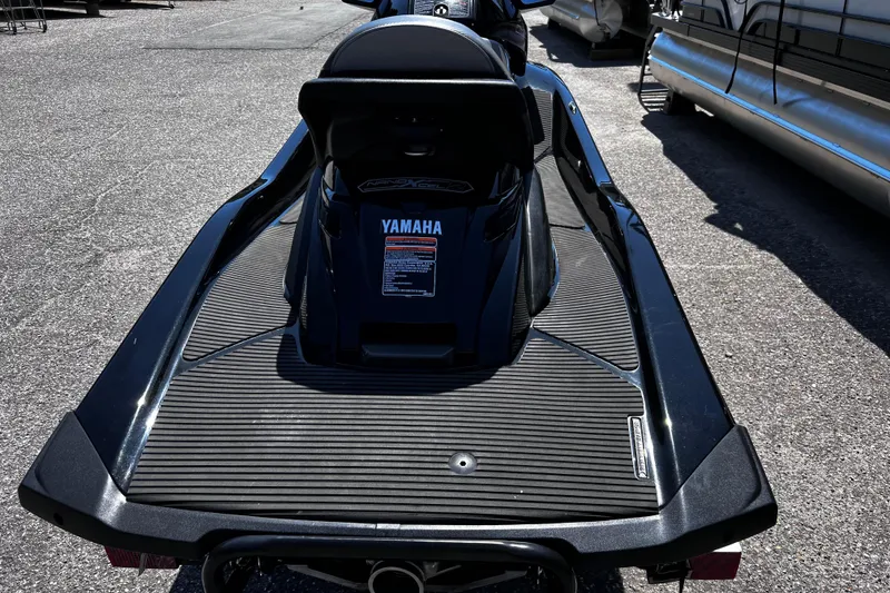 Slide: The Image of 2016 Yamaha WaveRunner FX Cruiser SVHO, rear view on pavement, showcasing sleek design. - 3