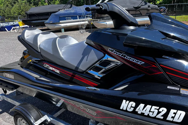 Slide: The Image of 2016 Yamaha WaveRunner FX Cruiser SVHO on trailer, black with red accents. - 4