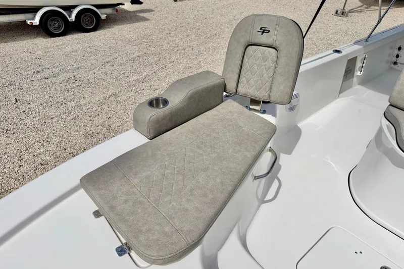 Slide: The Image of 2022 Sea Pro 248 Bay boat seat with cup holder, featuring quilted upholstery. - 12
