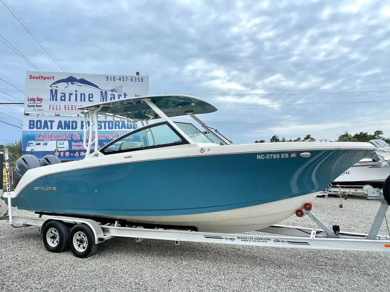 Slide: The Image of 2020 Stingray 269 DC boat on trailer at Marine Mart. - 10