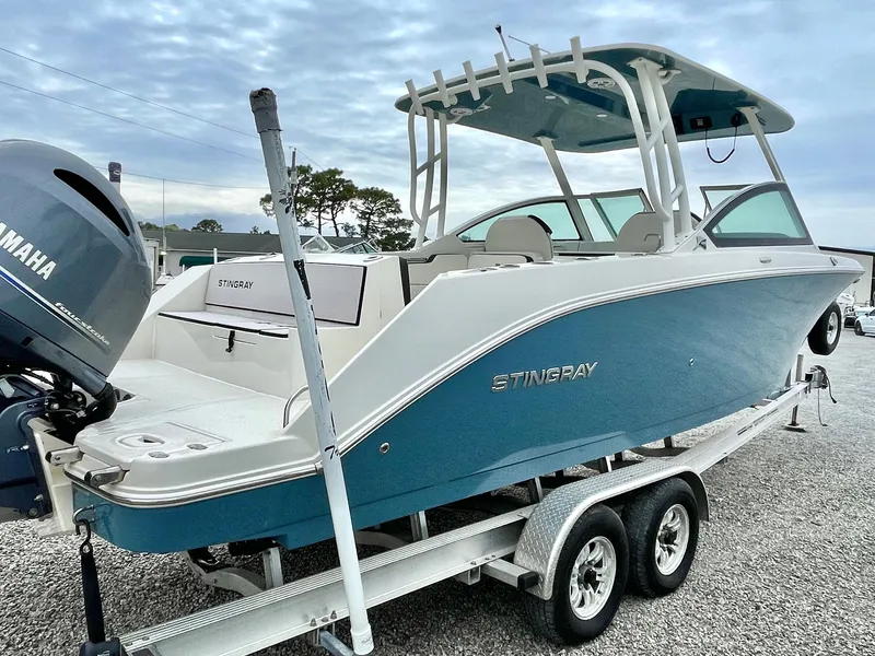 Slide: The Image of 2020 Stingray 269 DC boat on trailer with Yamaha engine. - 12