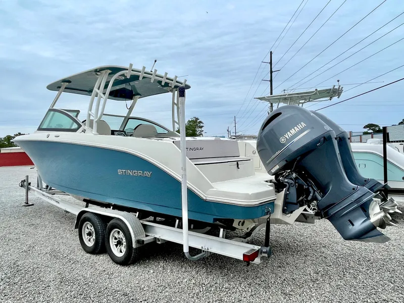 Slide: The Image of 2020 Stingray 269 DC boat with Yamaha outboard motor on trailer. - 14