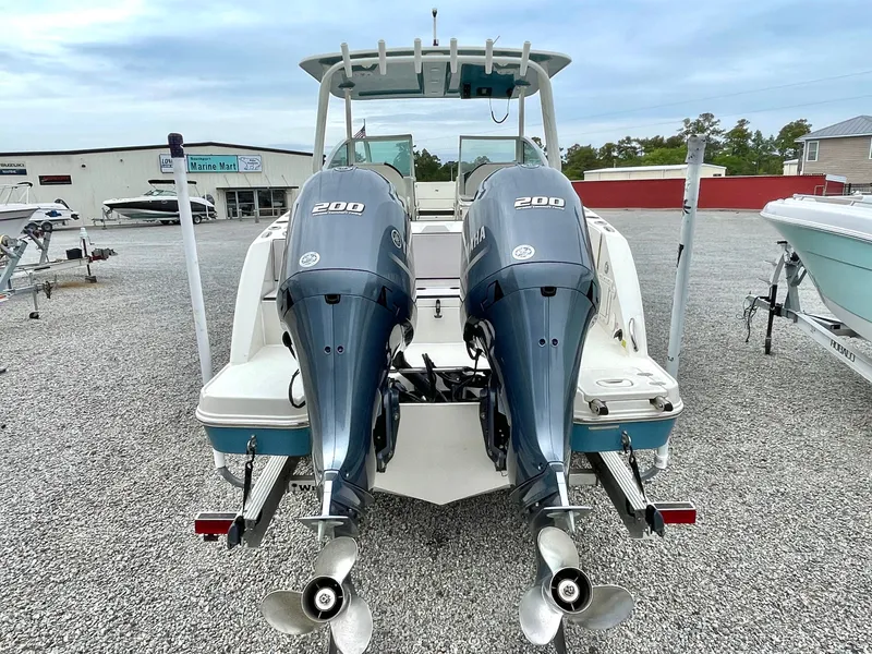 Slide: The Image of 2020 Stingray 269 DC boat with dual outboard engines. - 15