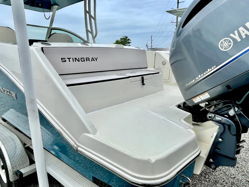 Slide: The Image of 2020 Stingray 269 DC boat with Yamaha outboard motor. - 16