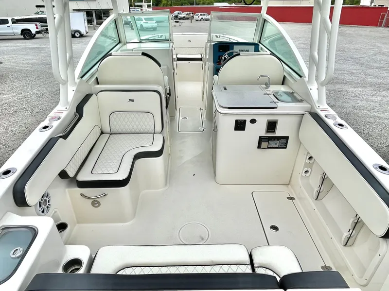 Slide: The Image of Interior of a 2020 Stingray 269 DC boat with seating area. - 19